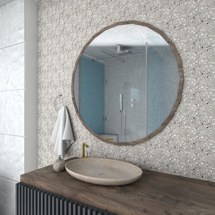 Hexagon-shaped terrazzo tile in modern grey, perfect for floors and backsplashes