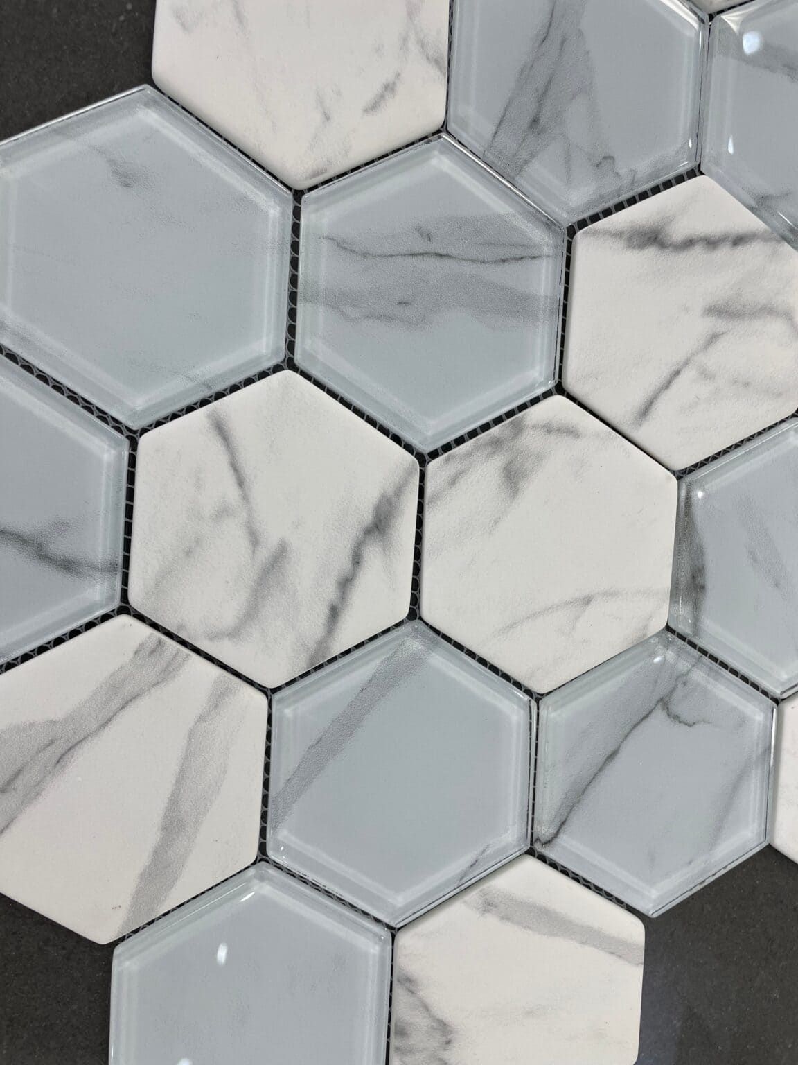 Calacatta-inspired glass mosaic tile with grand patterns, ideal for statement walls.