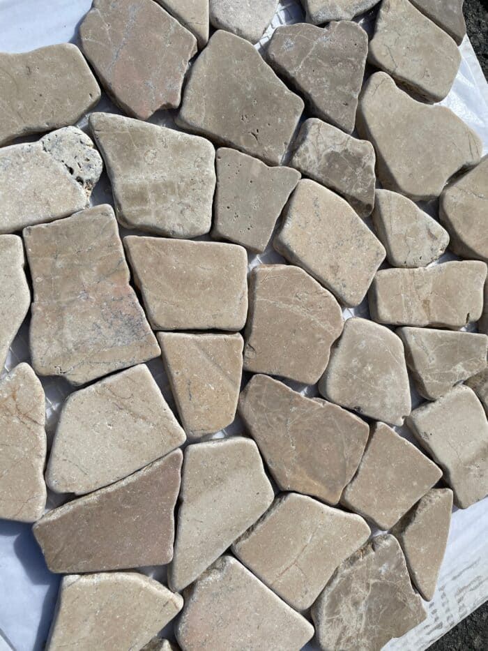 Cappuccino Beige Pebble mosaic tile with warm beige pebbles, great for floors or shower bases.