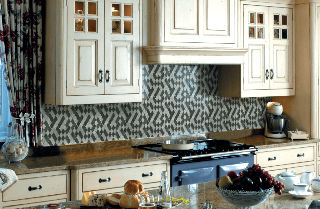 Dragon Glass mosaic tile with iridescent glass pieces in dark hues, ideal for striking backsplashes and feature walls.