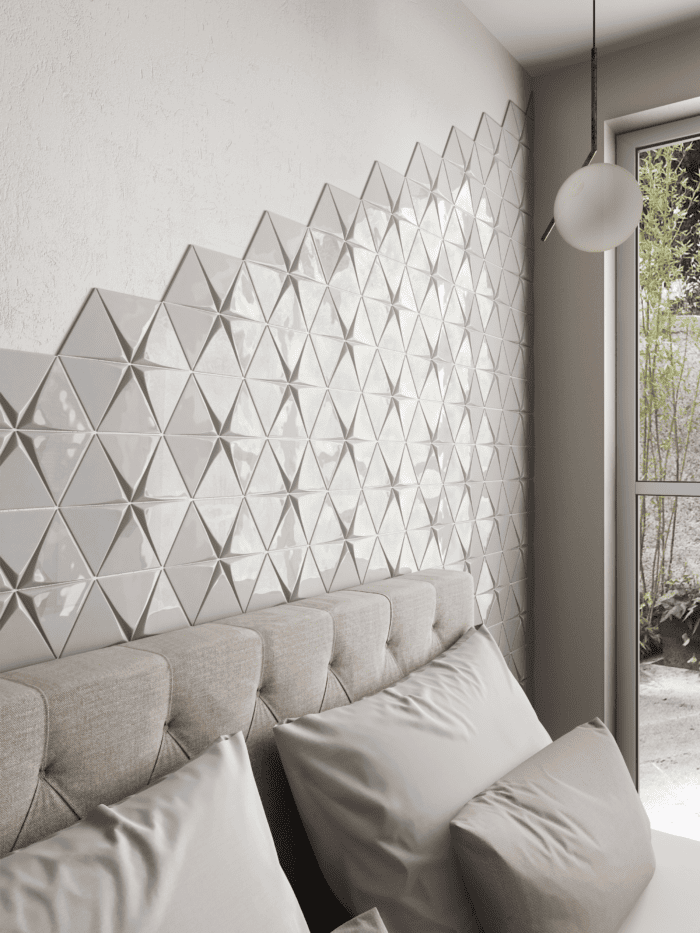 Light grey triangle ceramic tile from the Tirol collection, ideal for minimalist wall accents