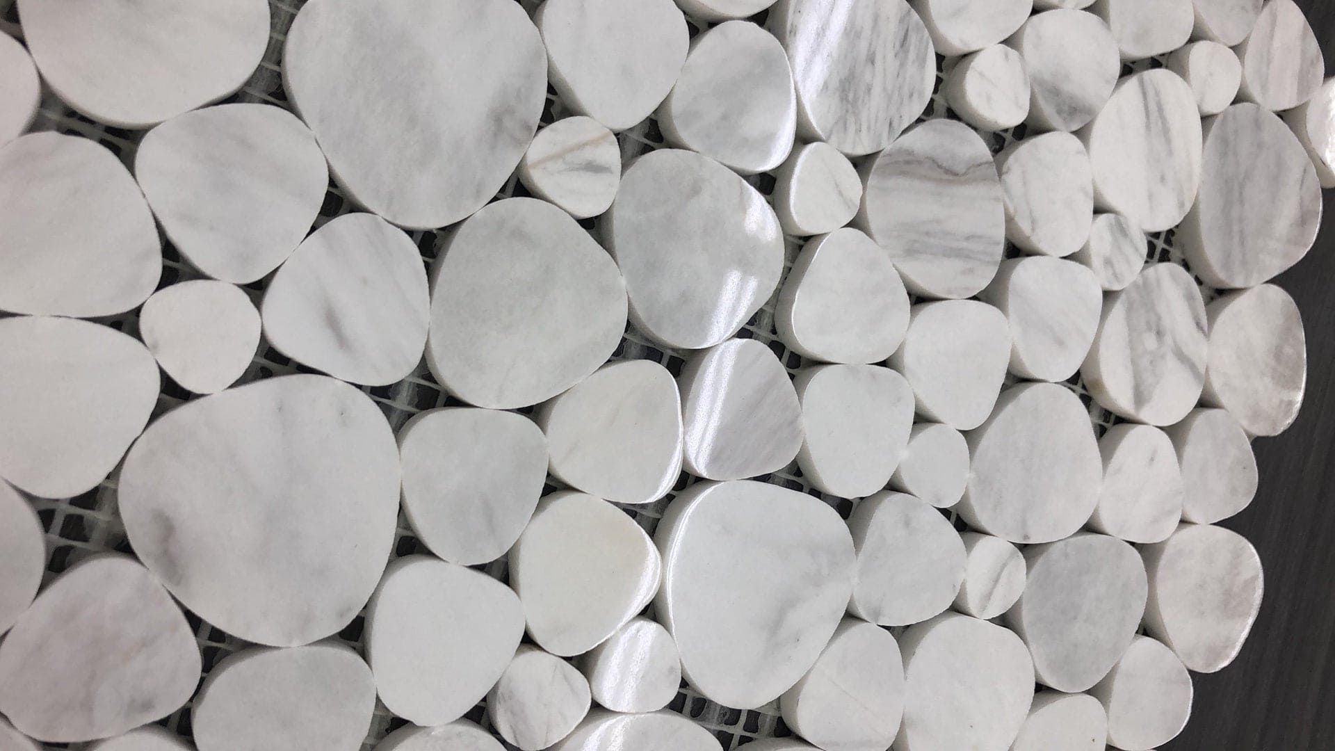 White Hearts Marble tile with heart-shaped pieces, a romantic touch for kitchens, baths, and accent walls.