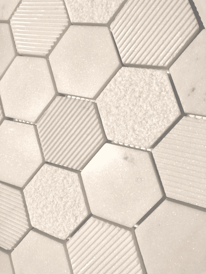 Hexagon-shaped Marmol Bianco mosaic tile with soft marble tones for refined interiors