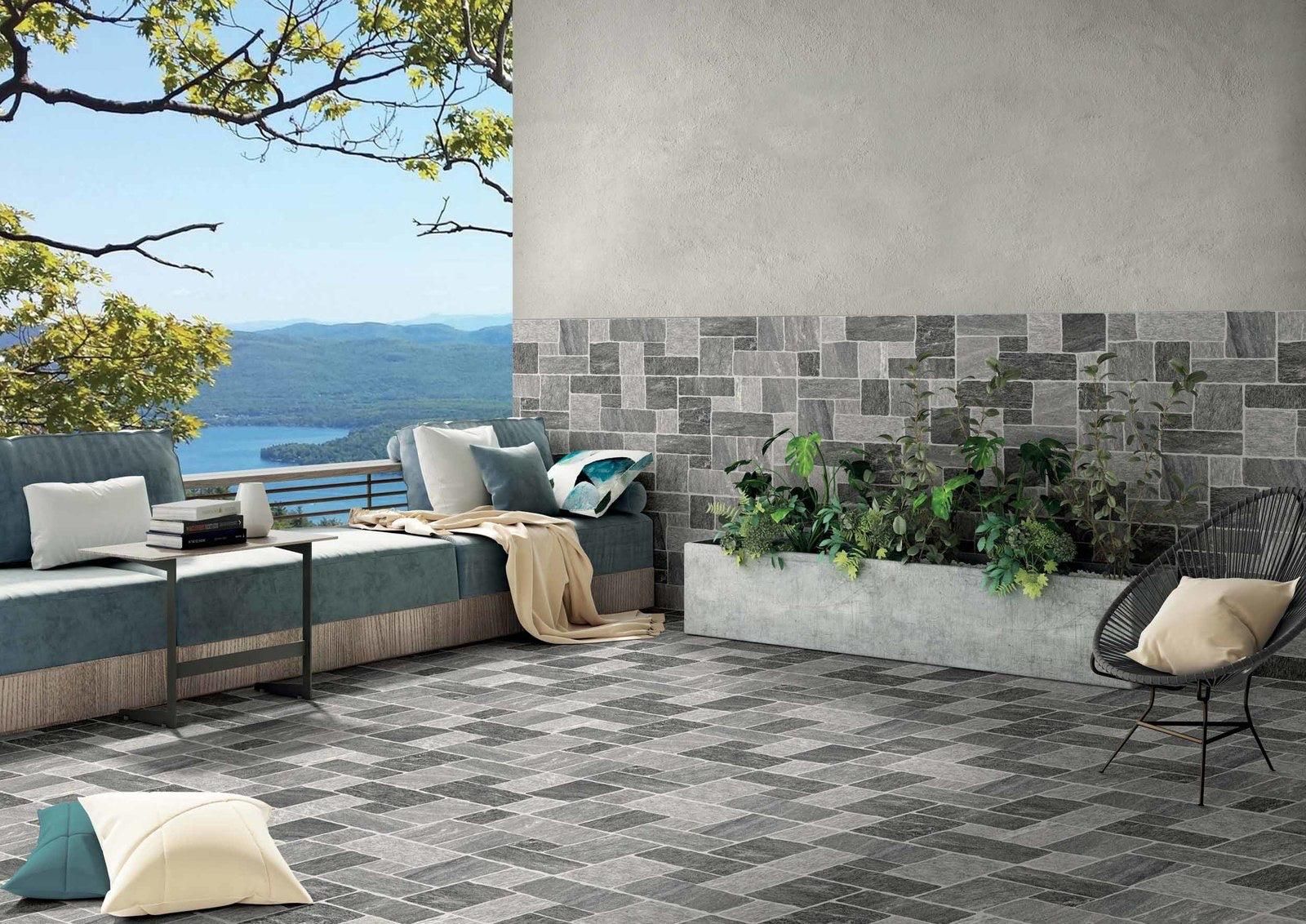 Muro di Siena tiles elevate the outdoor patio with rustic charm and natural stone texture on both floor and walls.