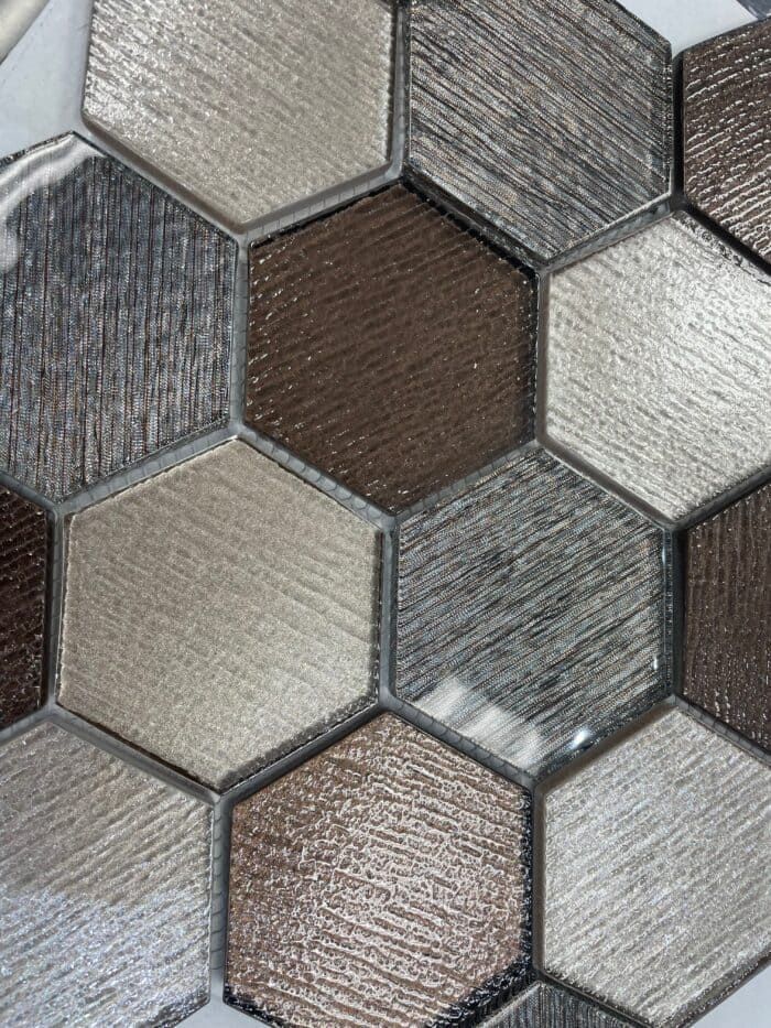 Hex Glass version of Piacenza combines marble effect with reflective glass accents.