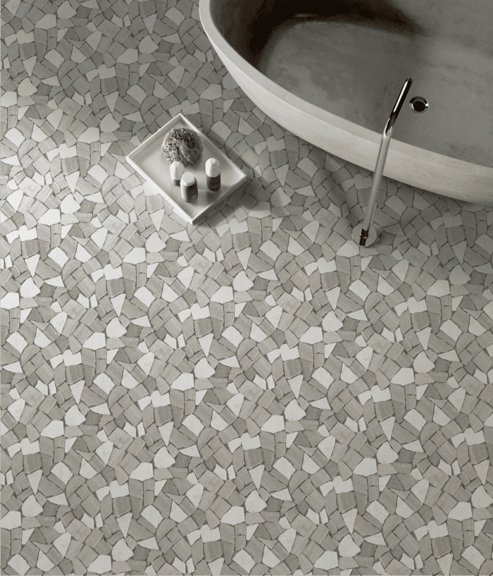 Bianco-Grigio Pietra mosaic blends light and dark pebbles for subtle contrast.