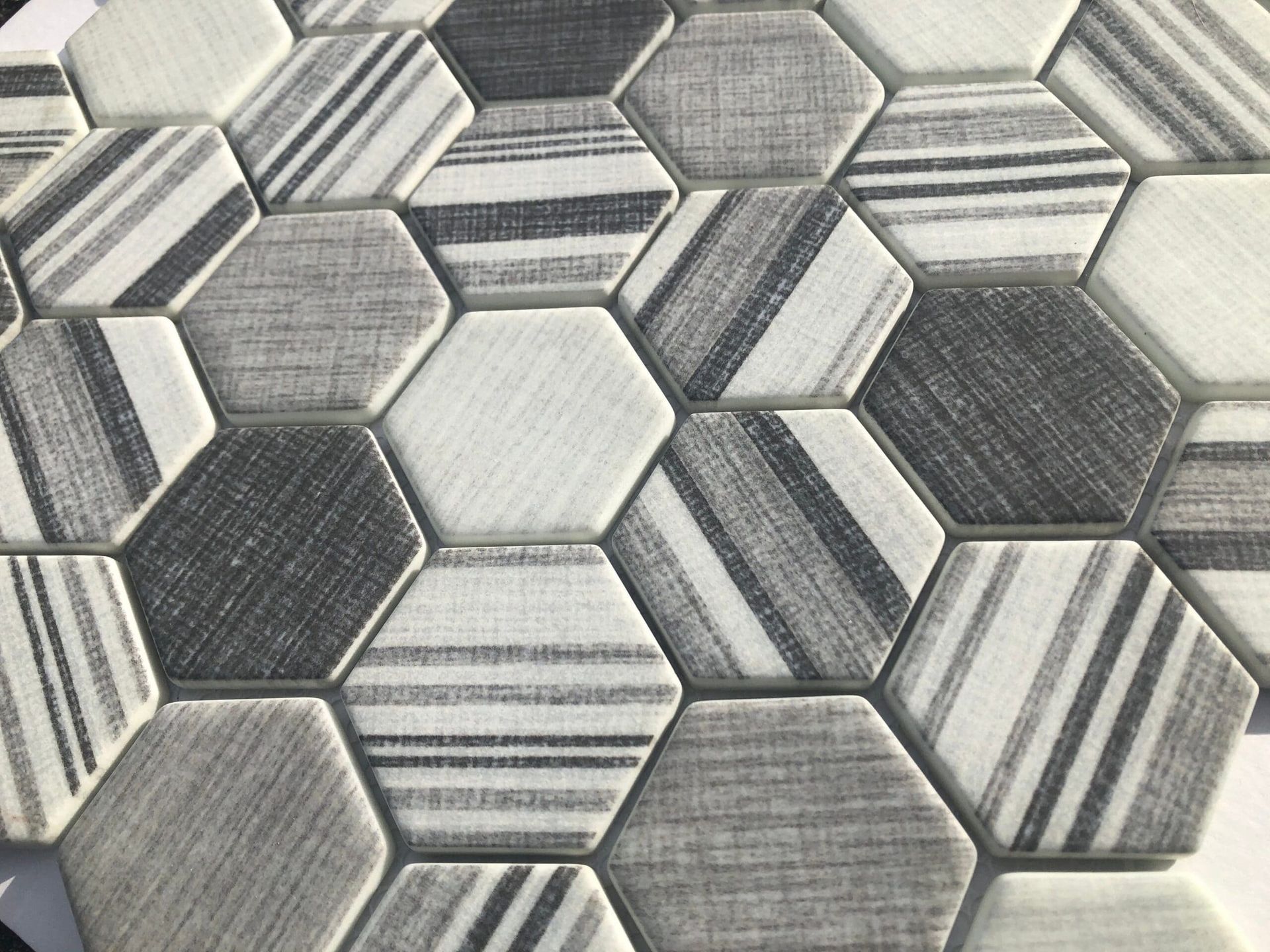 Roma Stripped Hex mosaic delivers striped hex tiles for a bold pattern statement.
