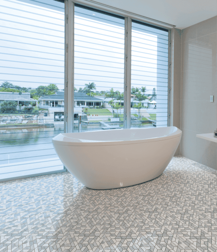 Skyline Marmol mosaic adds elegance and texture to a stylish bathroom floor