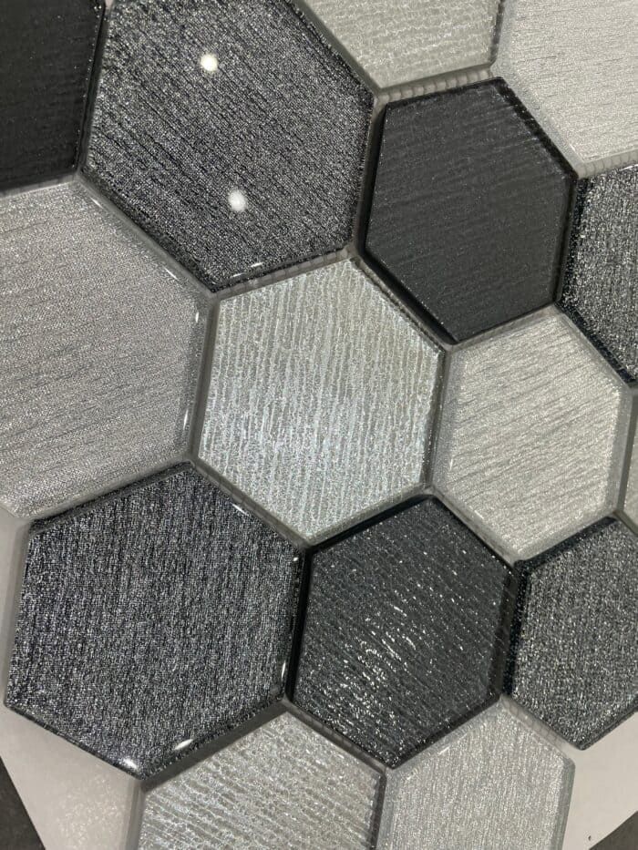 Hexagon-shaped glass mosaic from the Udine line, combining sleek style and light reflection