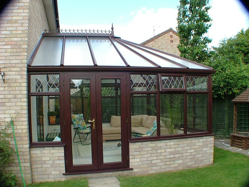 Brown uPVC Windows of Conservatory in Norfolk