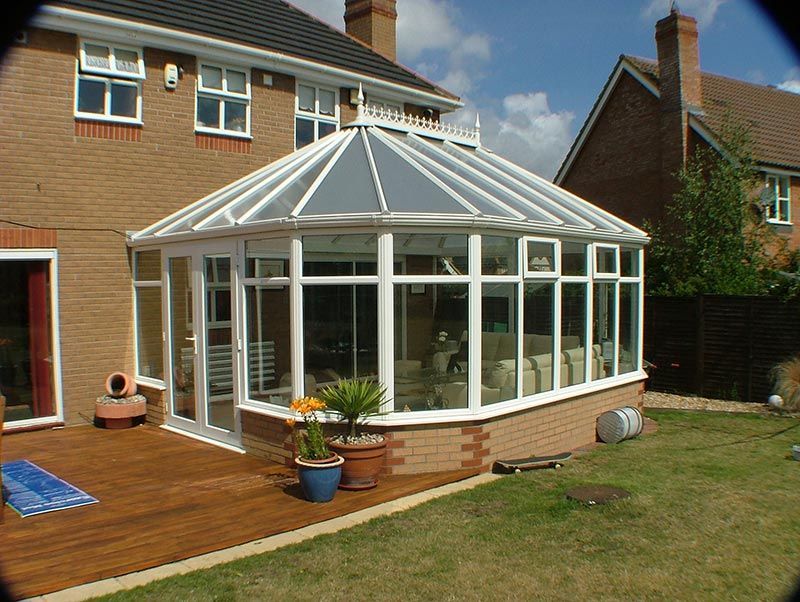 Large White Conservatory with Roof Embellishment in Norwich, Norfolk