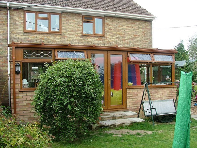 Conservatory with Half Wall and Leaded Glass Detail in Great Yarmouth