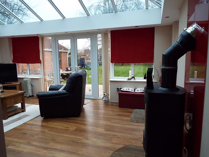 Living Room and Fireplace in Norfolk Conservatory