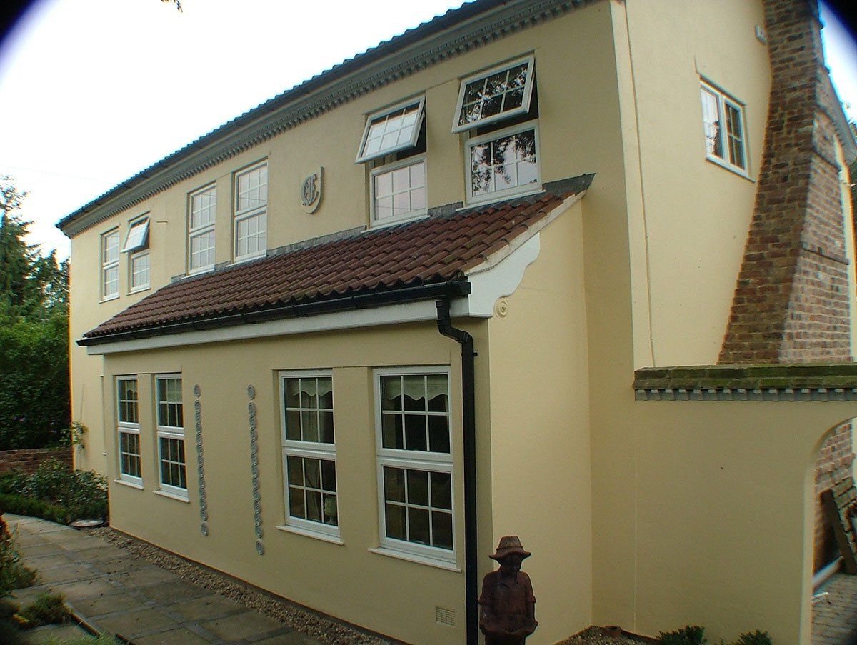 White Windows Fitted on Side of Norfolk Home