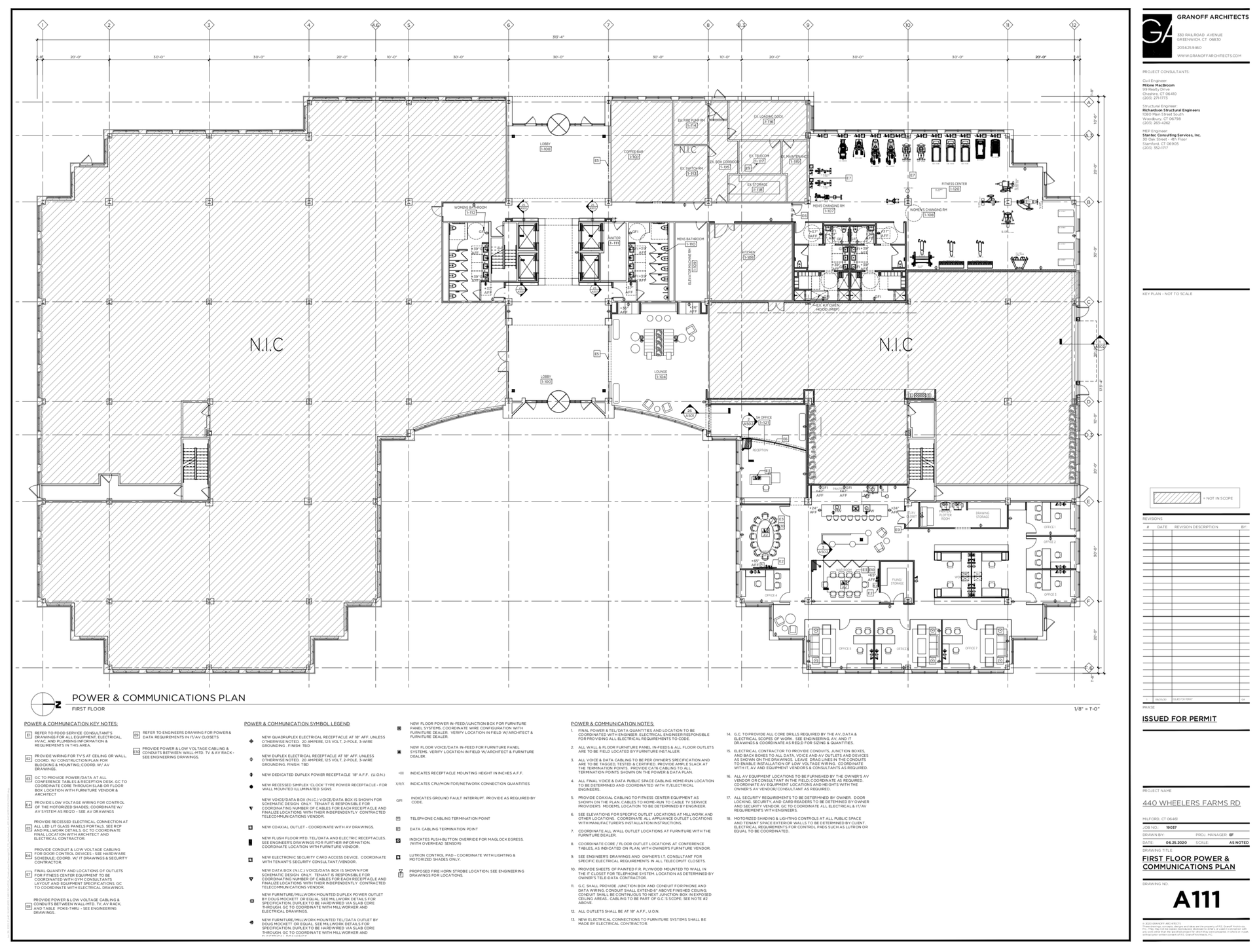 Architectural floor plan with shaded areas. Labeled rooms and details visible, including restrooms and elevators.