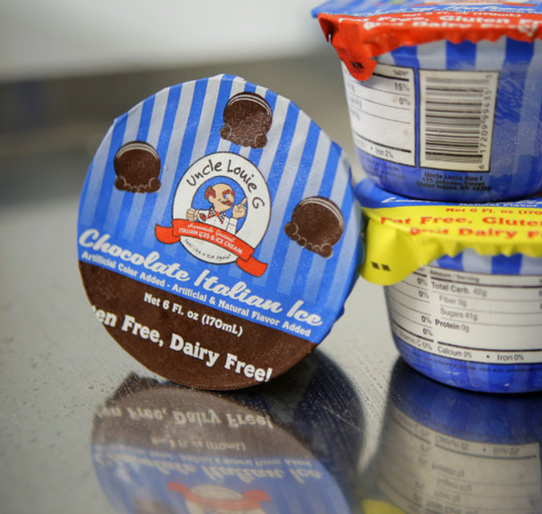 Uncle Louie G Chocolate Italian Ice cups stacked, with blue and yellow lids; gluten and dairy free.