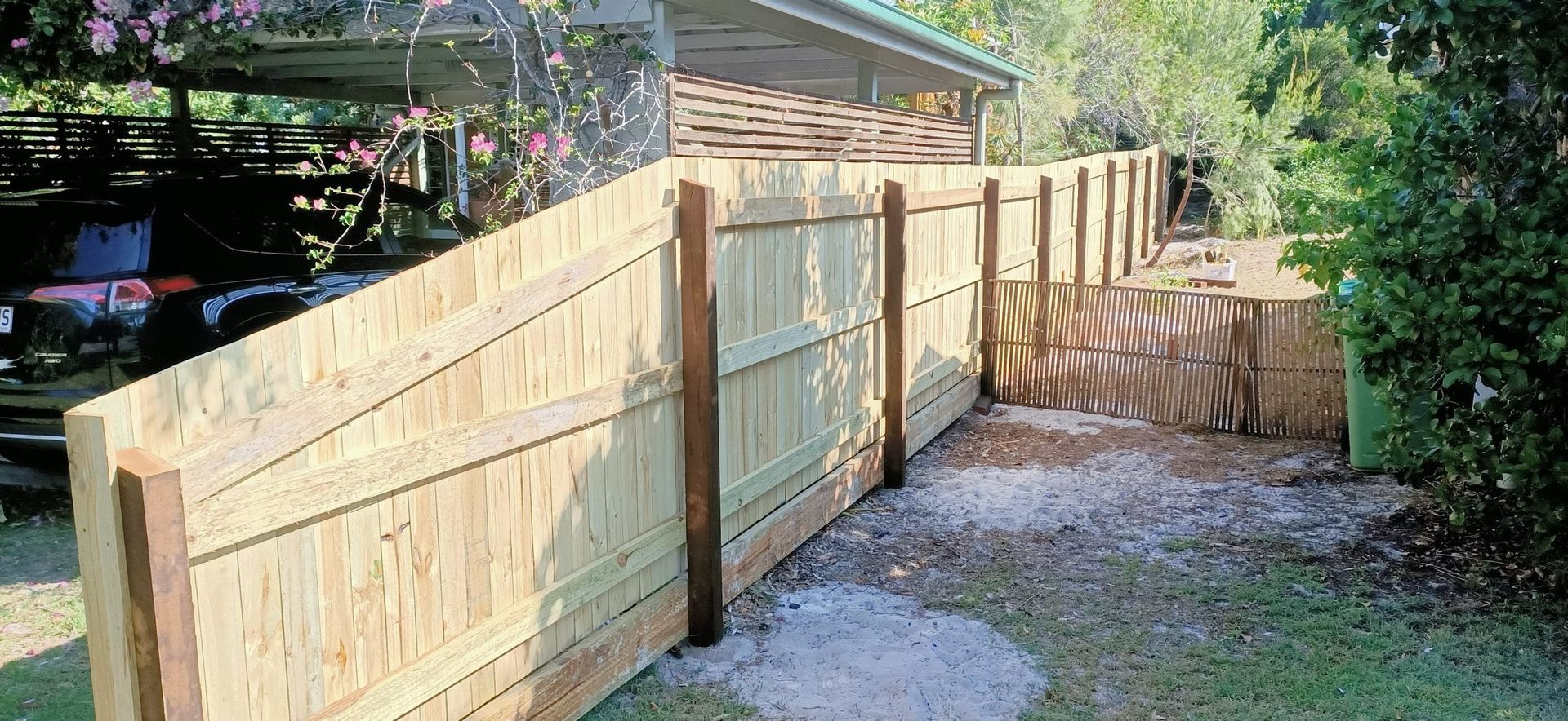 Newly Built Wooden Fence in a Yard — Quality Fences 4 U in Gympie, QLD