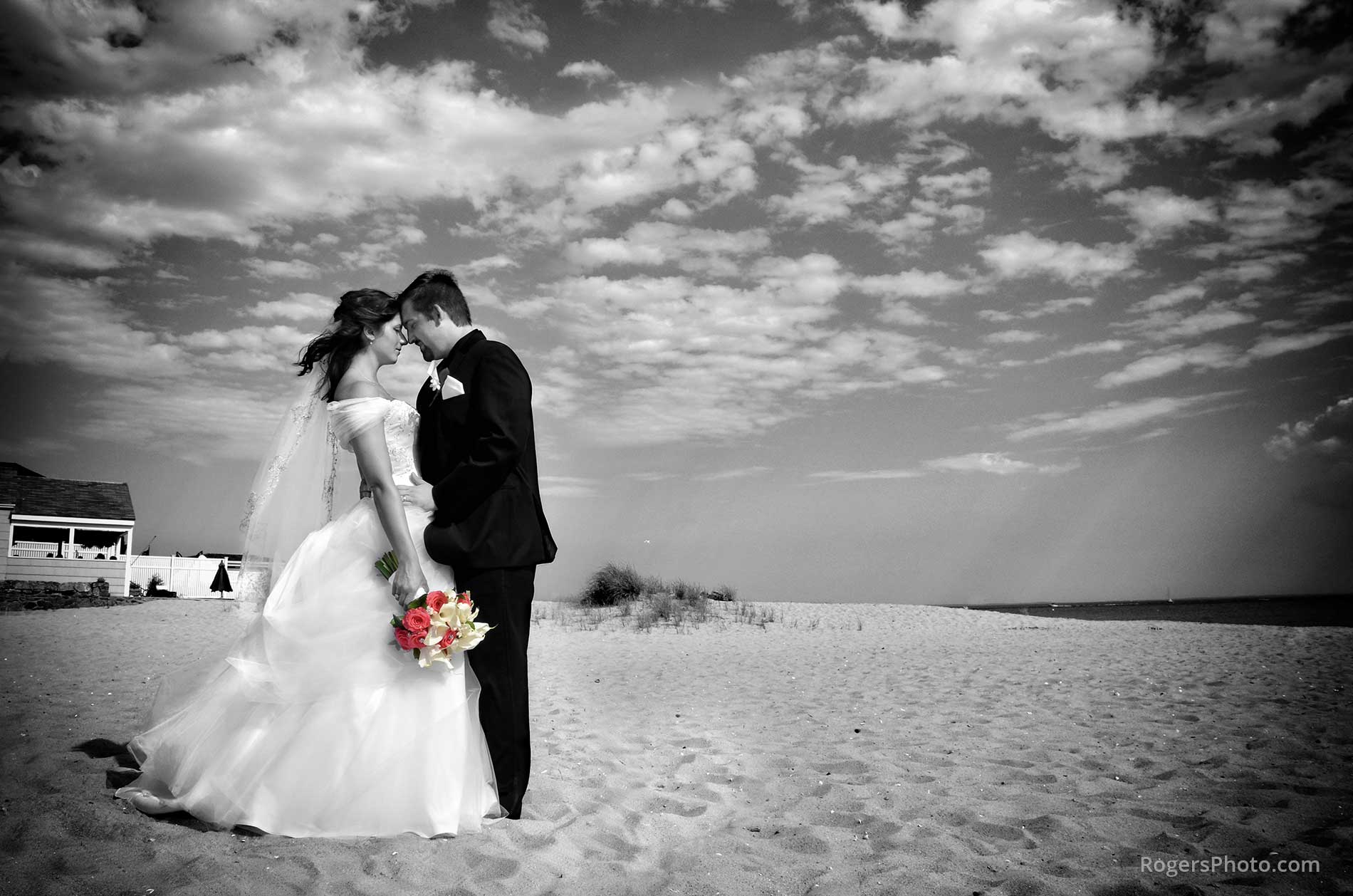 a bride and groom on the beach after major photo retouching