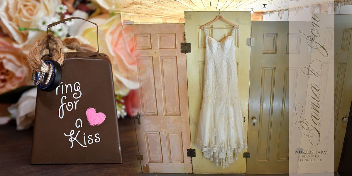 Bridal gown hanging up at Nuzzo's Farm wedding photography by Connecticut Wedding Photographers Rogers Photography.