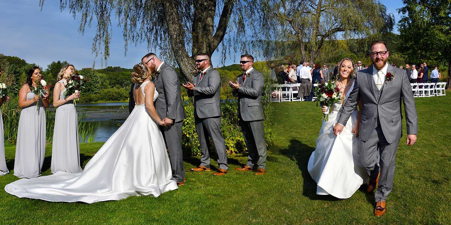 A bride and groom are walking down the aisle with their wedding party at The Lake House wedding photography by Connecticut Wedding Photographers Rogers Photography.