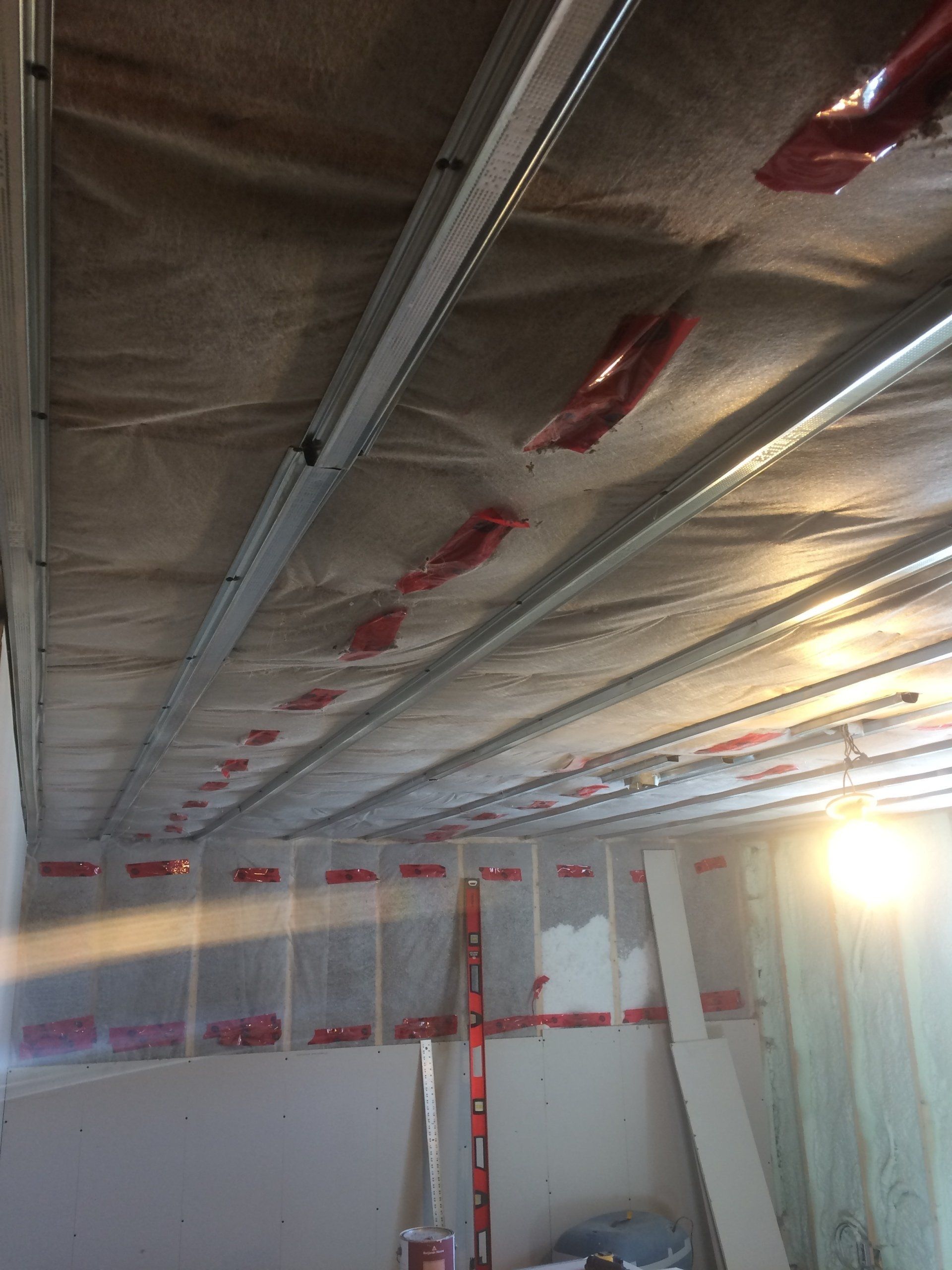 A room with a ceiling that is covered in plastic.