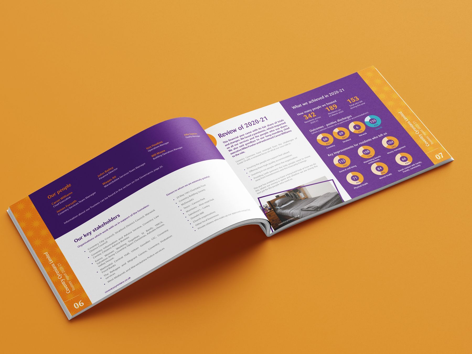 A book is open to a page with a picture of a train on it.