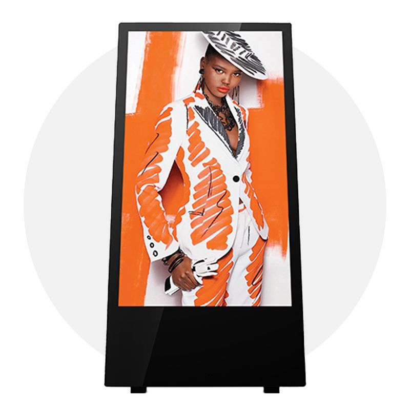 Digital display showing a model in an orange and white suit.
