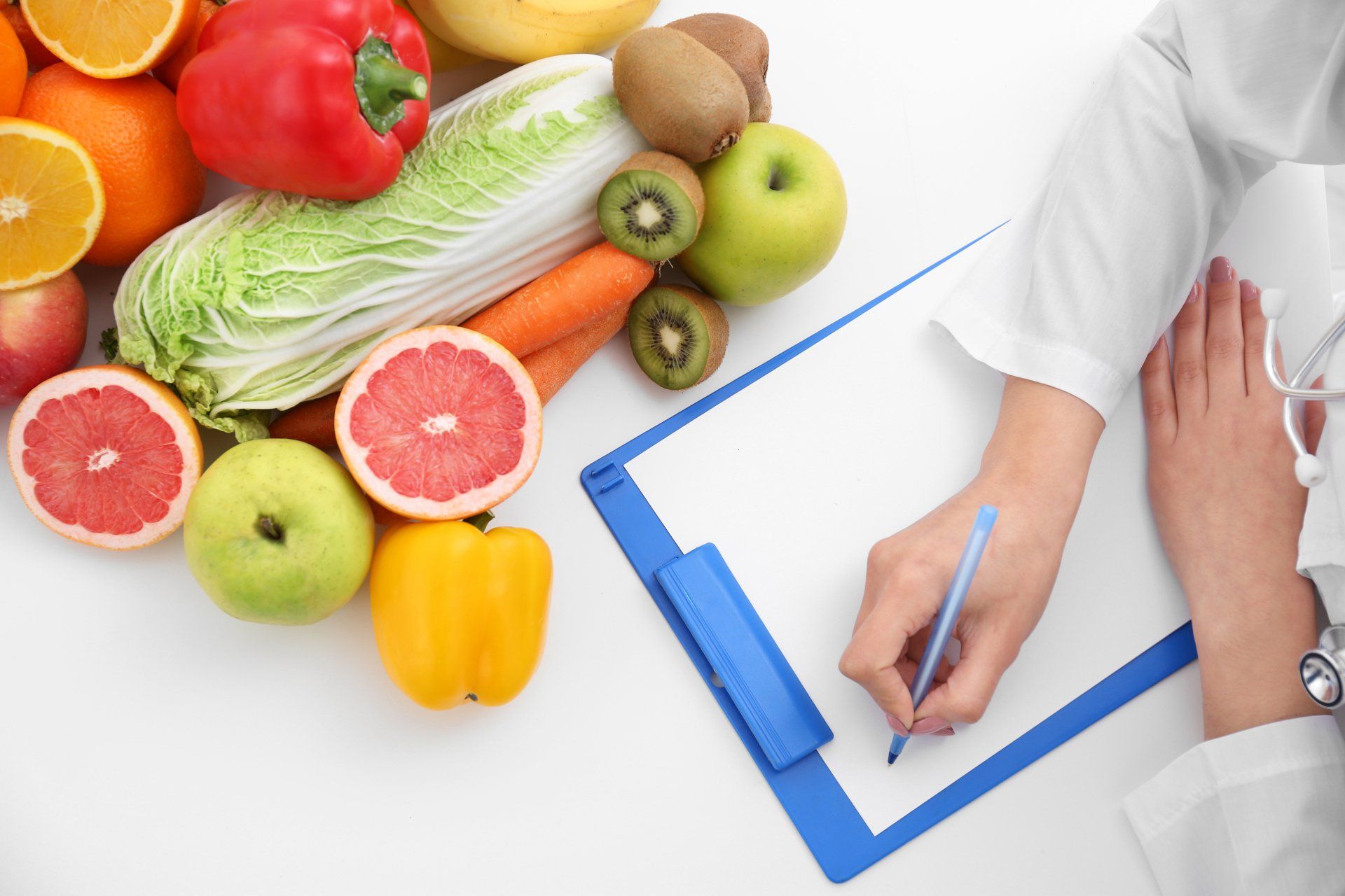 Nutricionist doctor writing a diet plan