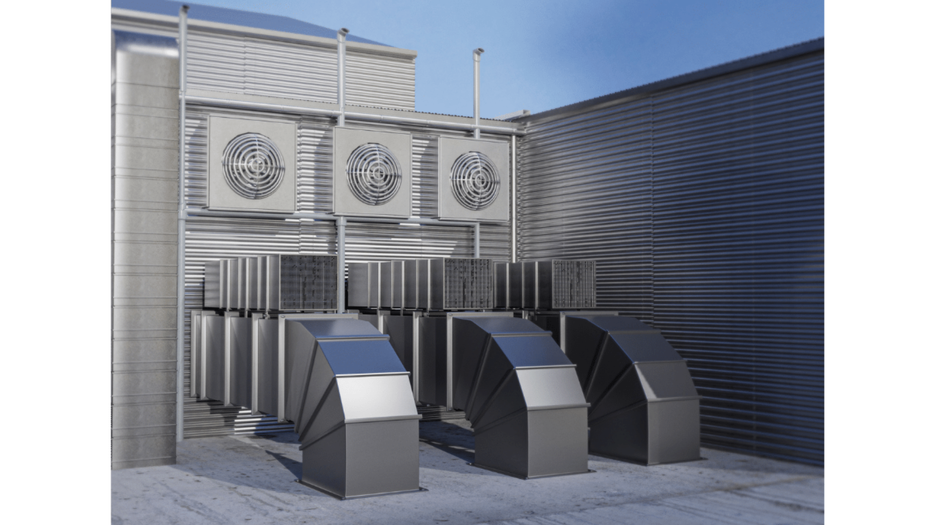 A row of stainless steel ducts on the side of a building.