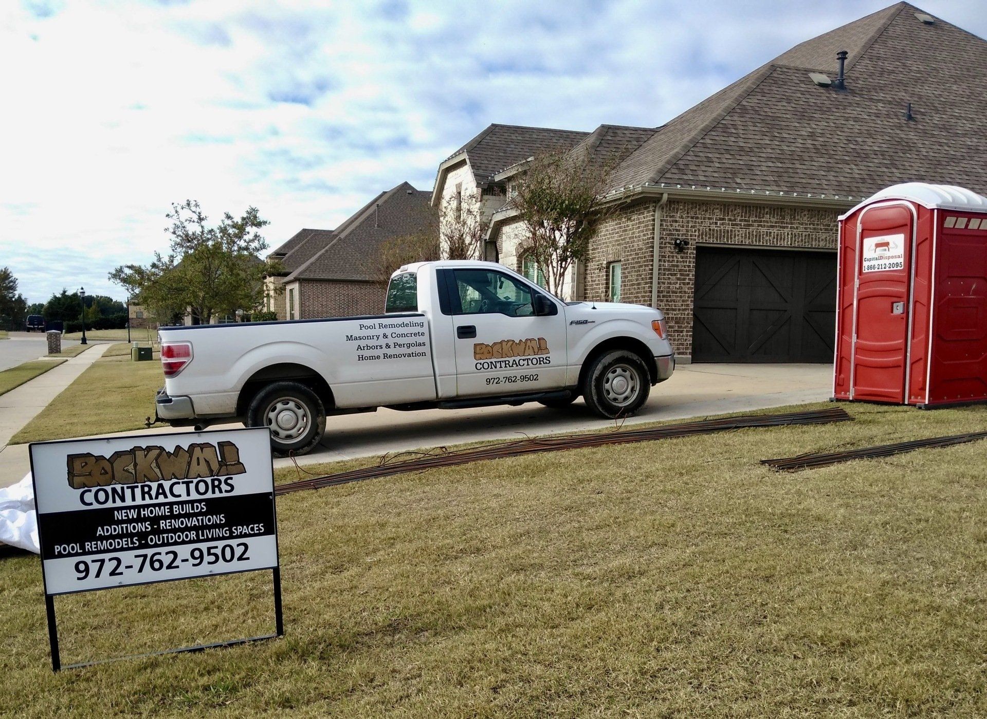 Rockwall Contracting company vehicle parked outside residential driveway