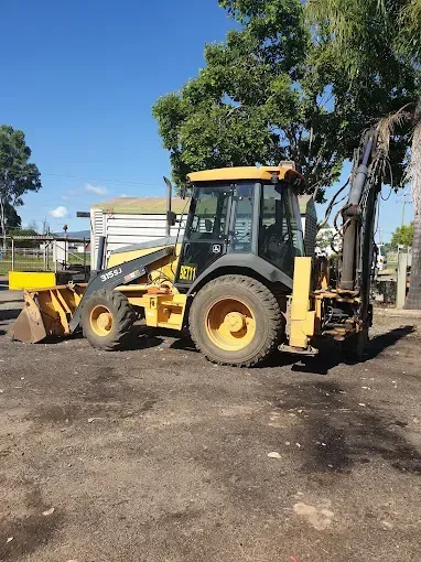 Hand Using a Wrench to Work on a Car Engine — RCM Diesel & Hydraulic Services in Emerald, QLD