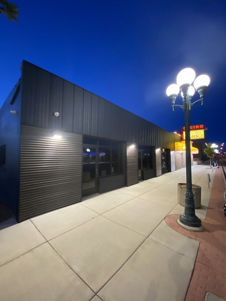 A building with a sign that says ' apollo ' on it