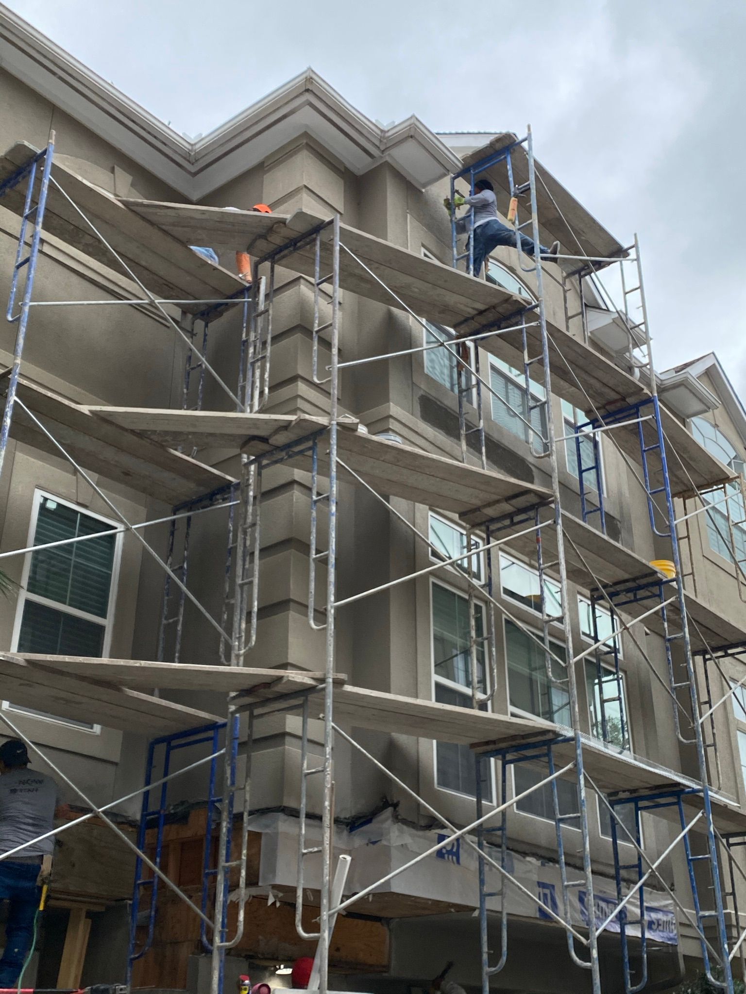 A building under construction with scaffolding around it.