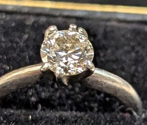 Ring with damaged bent prongs
