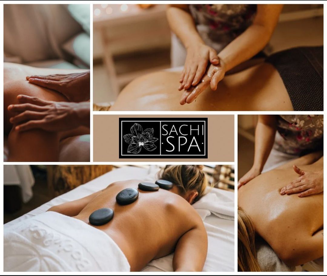 A woman is getting a massage at the sachi spa