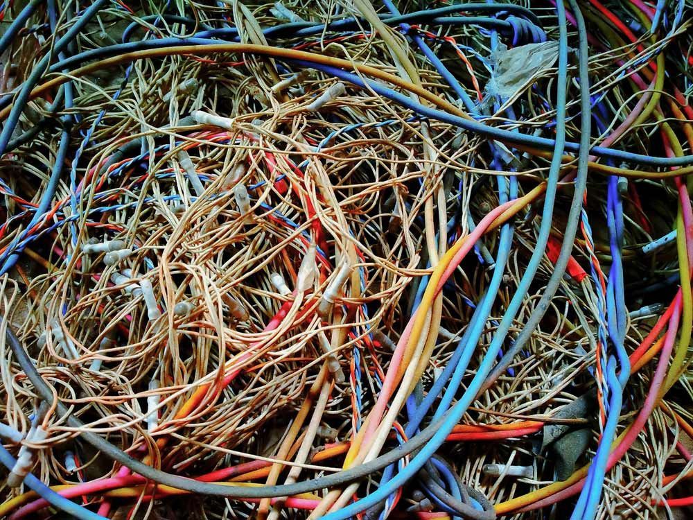 Assorted pile of colourful cable scrap — Professional Scrap Metal Recycling in Darwin, NT