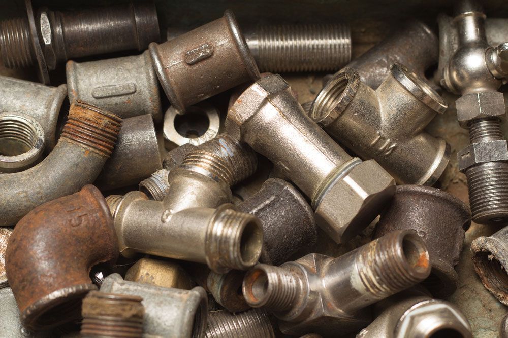 Stack of Old Brass Scrap for Recycling — Professional Scrap Metal Recycling in Winnellie, NT