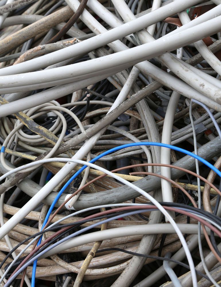 Numerous cable skeins prepared for recycling at materials reclamation site — Professional Scrap Metal Recycling in Winnellie, NT