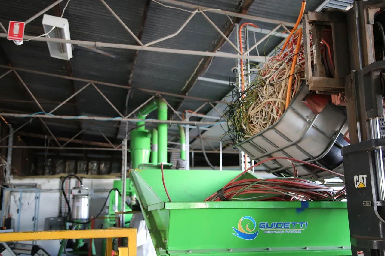 Assorted electrical cables within a machine, ready for recycling — Professional Scrap Metal Recycling in Darwin, NT