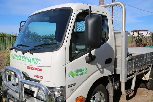 Image of a recycling truck in Darwin, collecting and transporting recyclable materials — Professional Scrap Metal Recycling in Woolner, NT