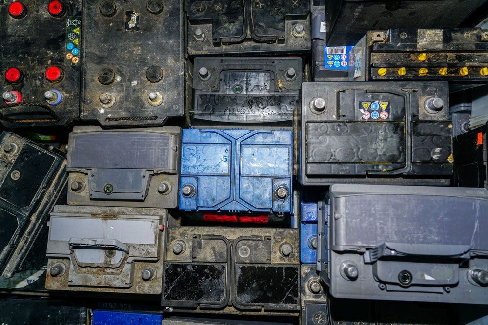 Overhead Perspective of Numerous Used Vehicle Batteries Ready for Recycling — Professional Scrap Metal Recycling in Darwin, NT