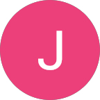 Pink circle with the white letter 