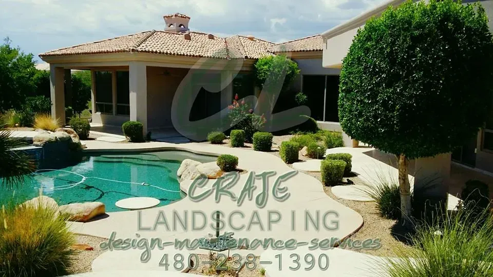 A house with a pool and a sign that says crate landscaping