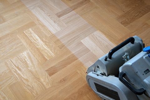 Floor sander refinishing Parquet flooring 