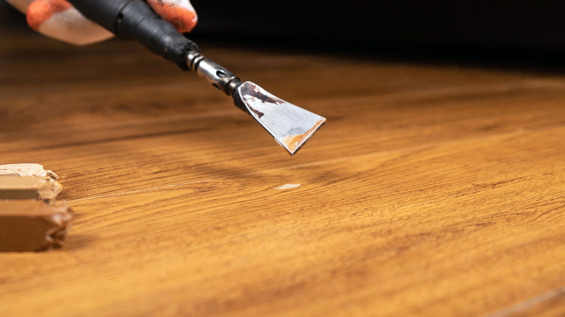 Wood floor being repaired
