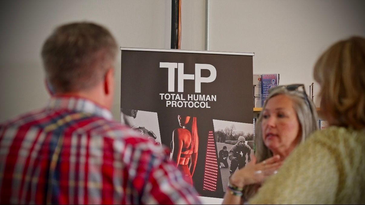 Total Human Protocol banner with guests