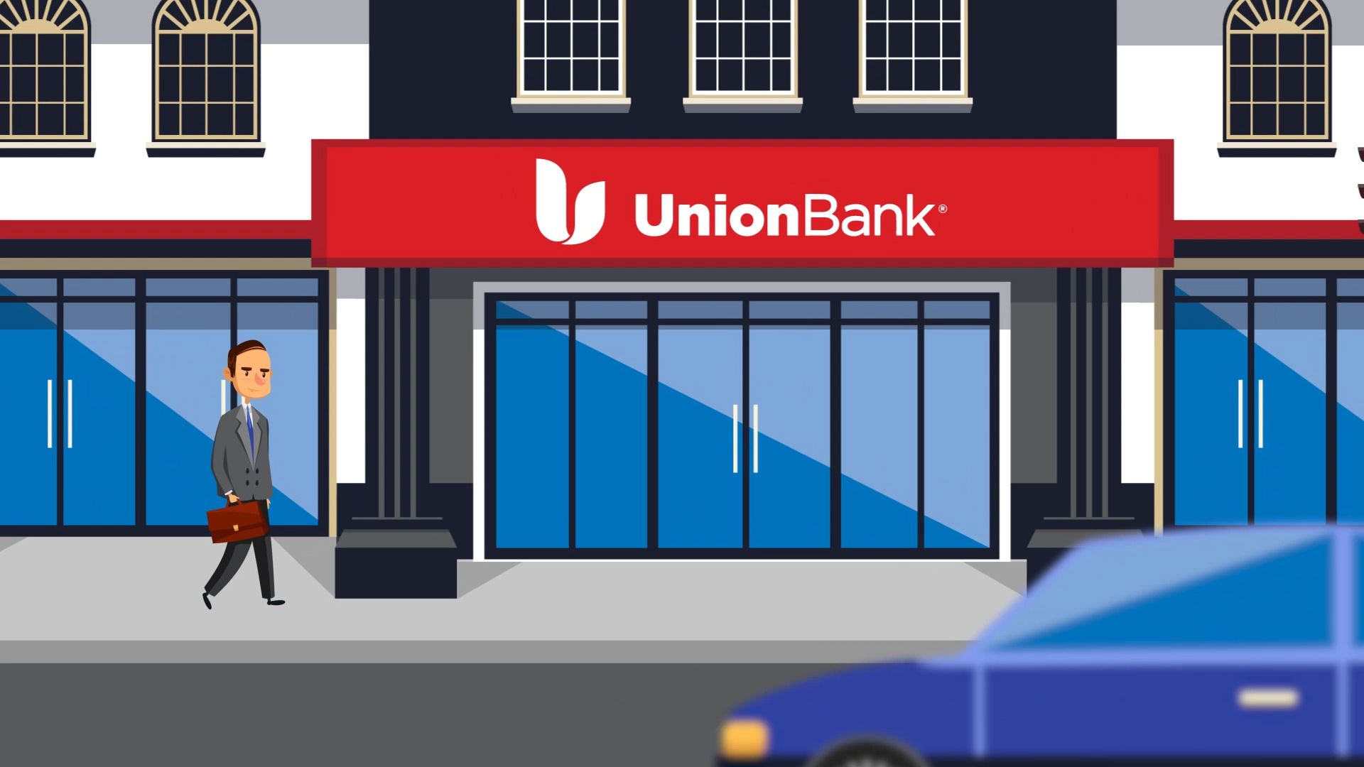 Man walking by a Union bank building 