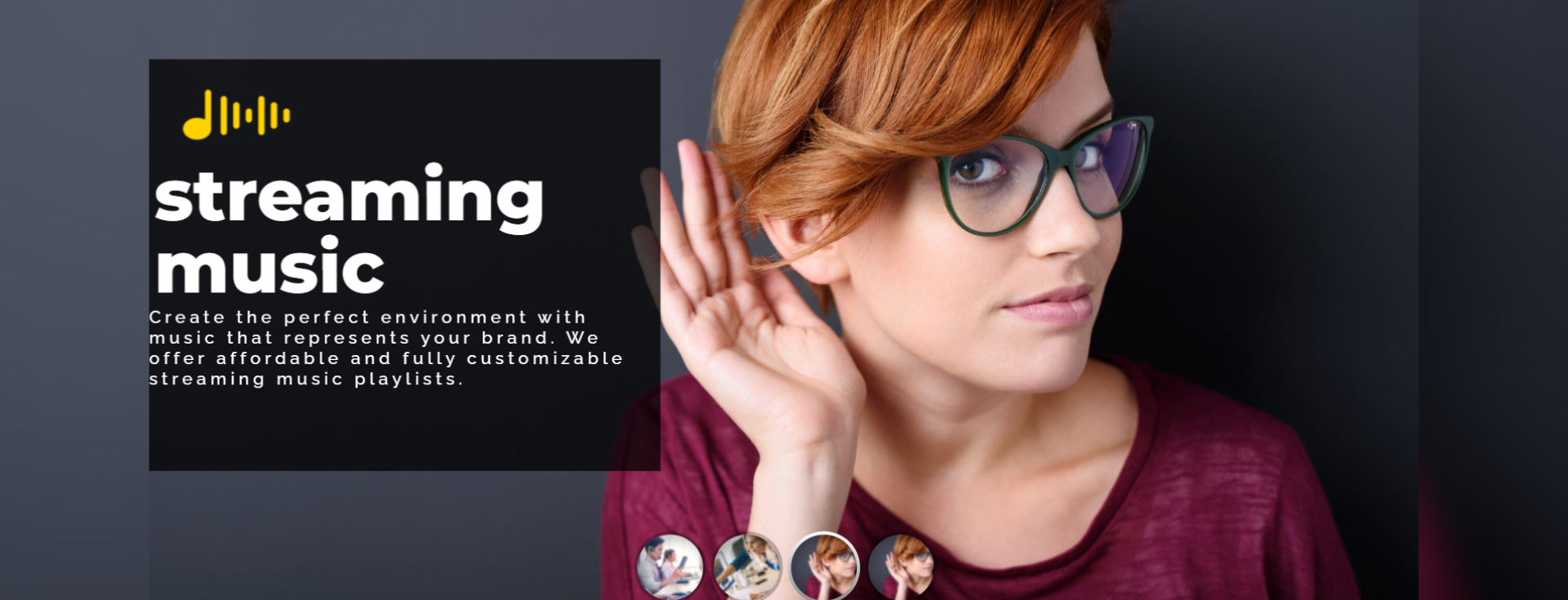 A woman wearing glasses is holding her hand to her ear.