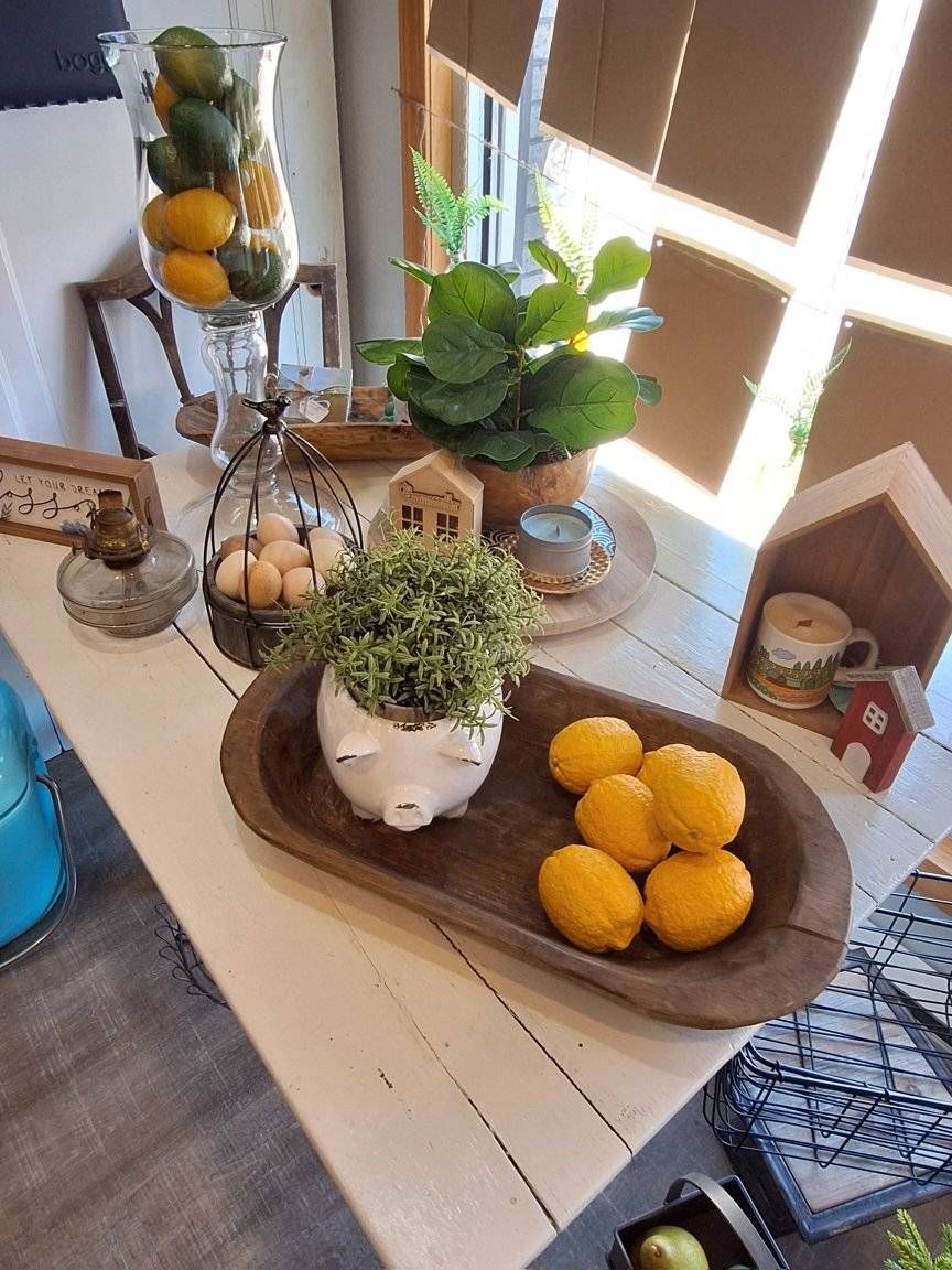 A boat is sitting on a trailer in a garage.