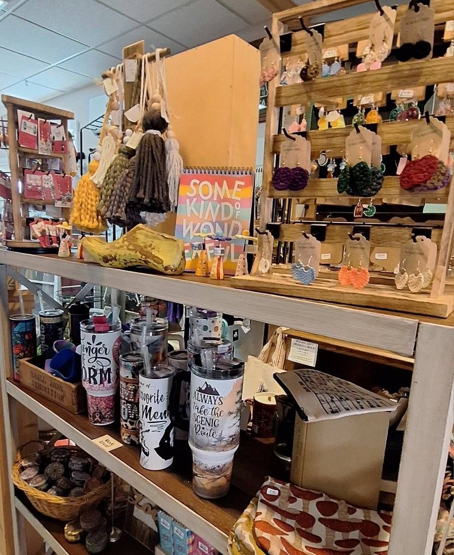 A boat is sitting on a trailer in a garage.